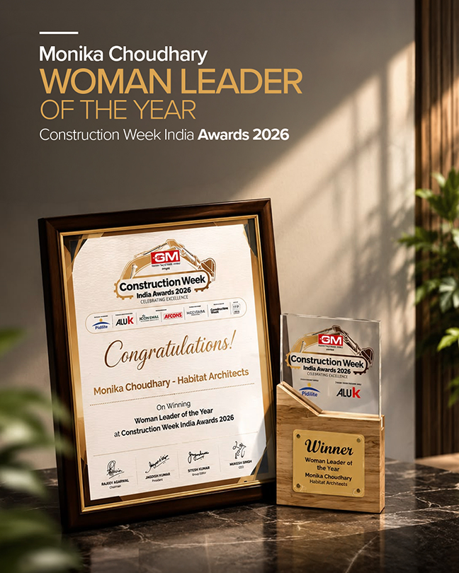 Monika Choudhary and fellow attendees holding the Woman Leader of the Year award at the Construction Week India Awards 2026.