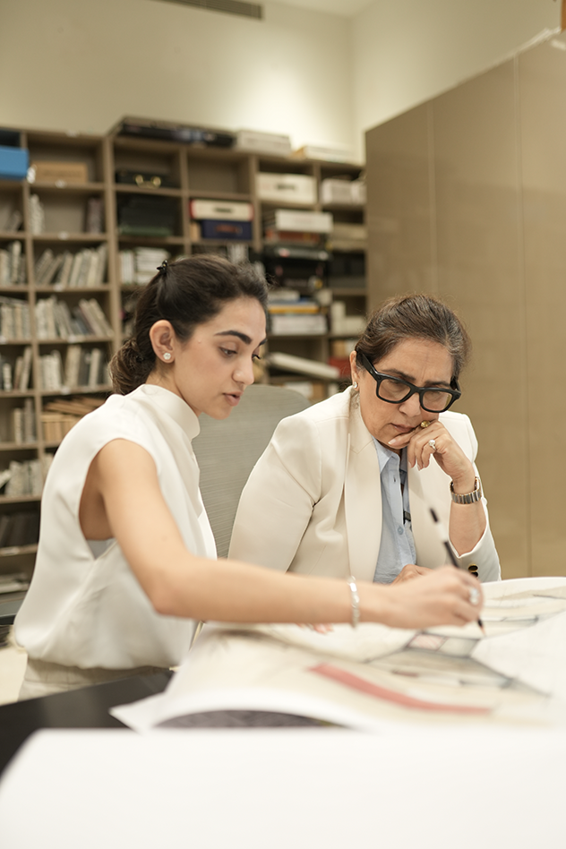 Monika and Sarah Choudhary working together during the AFTER LIFE curation